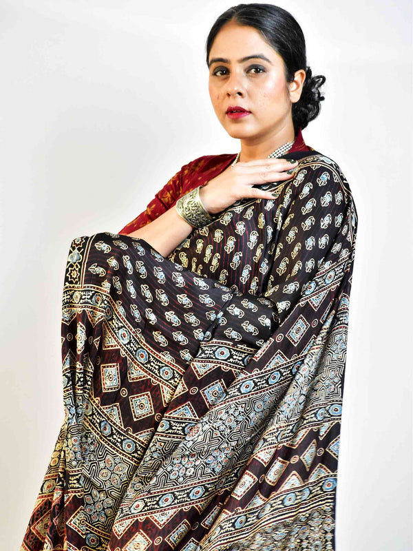 Firefly  - Ajrakh hand block printed Modal Silk Saree with zari pallu