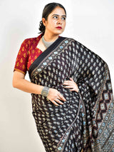 Firefly  - Ajrakh hand block printed Modal Silk Saree with zari pallu
