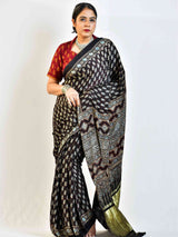 Firefly  - Ajrakh hand block printed Modal Silk Saree with zari pallu