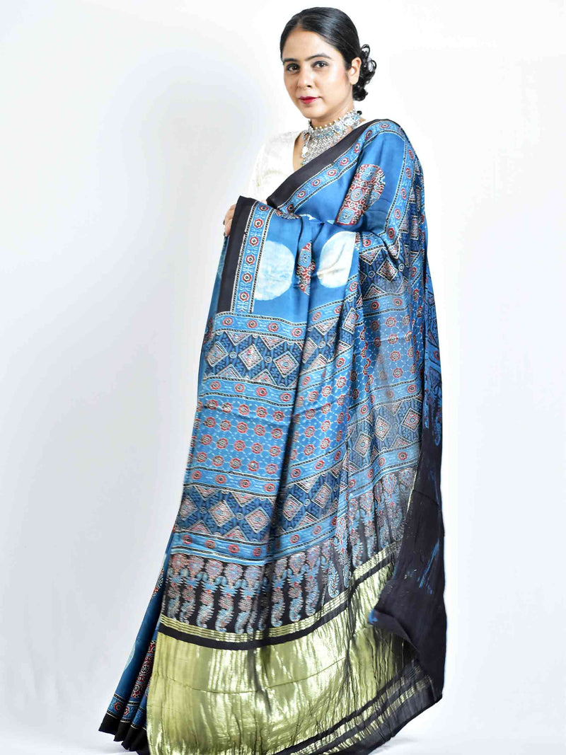 Blue moon - Ajrakh hand block printed Modal Silk zari pallu Saree