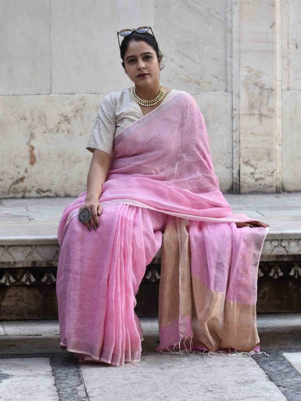 Pink Linen handwoven saree with temple border