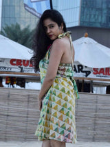 Dabu halter neck dress posing at beach