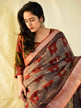 Roshini - Ajrakh handloom Kota Doria saree with zari border