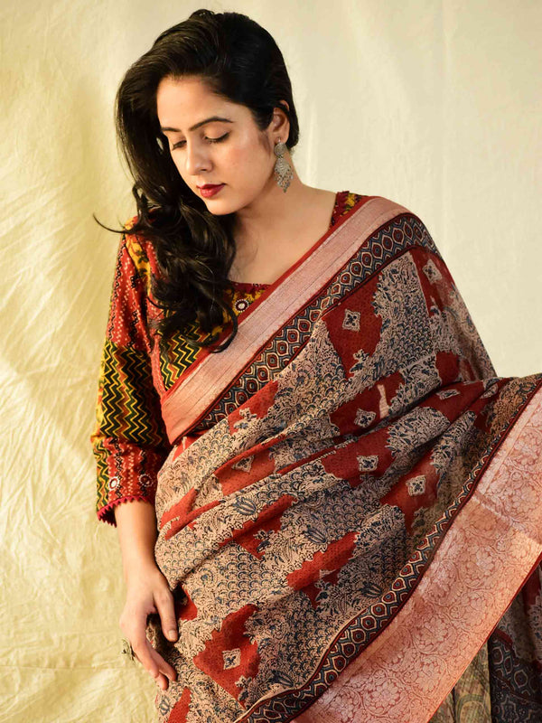 Roshini - Ajrakh handloom Kota Doria saree with zari border