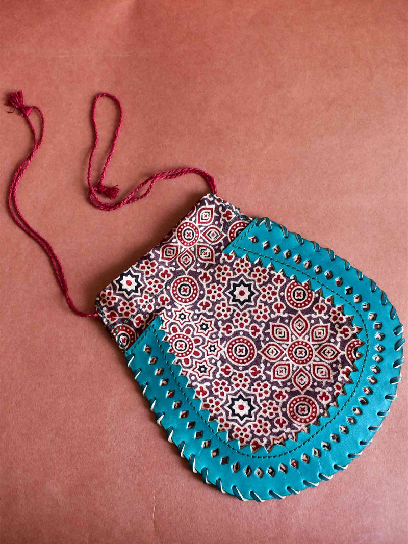 Earthy rhythm - mashru silk and leather coin potli