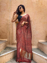 Maroon Ajrakh hand block printed Modal silk saree with zari pallu
